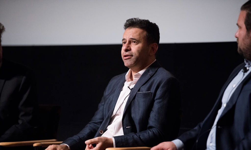 Marty Makary is seated against a black and gray backdrop.