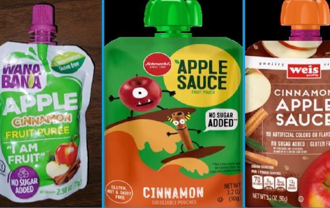Three recalled applesauce pouches pictured laying flat on a table.